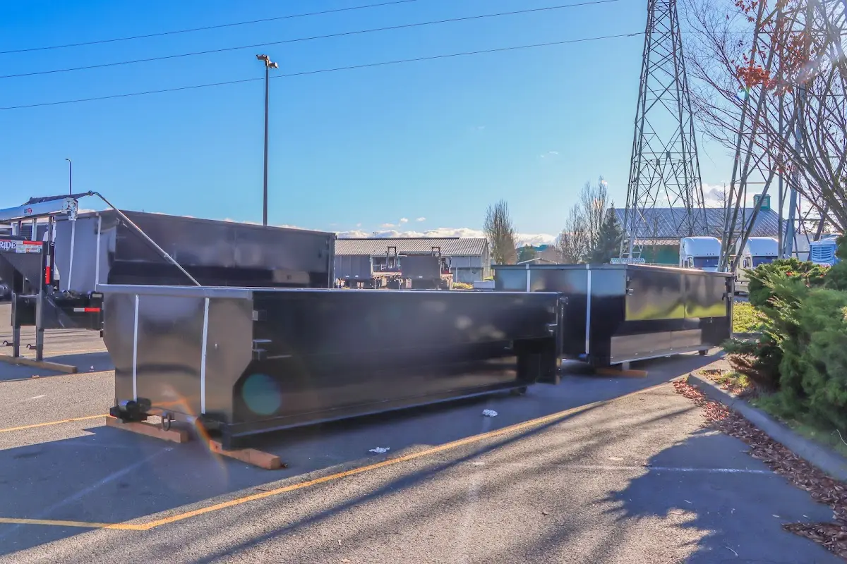 Roll-off dumpster ready for waste disposal at job site for Yard Waste Dumpster Rental in River Falls